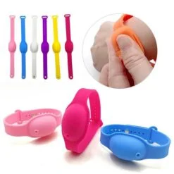 A boy is using hand sanitizer dispenser bracelet for sanitizing his hands. Hand sanitizer bracelet is shown in different colors.