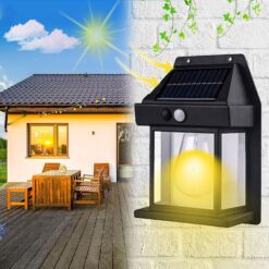 Black color solar waterproof wall light is mounted outside the house.