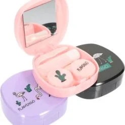 Contact lens case with mirror is shown in pink, black, and purple color.