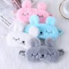 Closed eye rabbit design plush eye mask is presented in grey, white, sky blue, and light pink color.