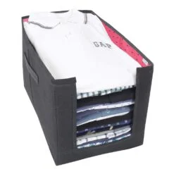 All the shirts are arranged in a black color non woven shirt stacker
