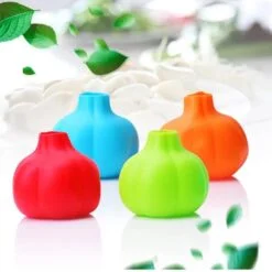 Silicone garlic peeler is presented in red, blue, green, and orange color.