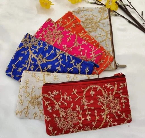 Angoori design embroidered pouch shown in red, white, blue, pink, and orange color.