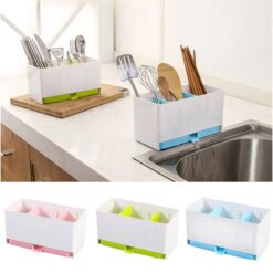 Spoons and chopsticks are organized in a plastic 3 compartment cutlery spoon knife holder near sink.