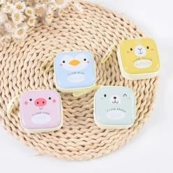Cartoon earphone case is presented in 4 different designs and colors.