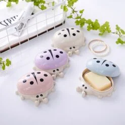 Lady bug soap case with lid is presented in 4 different color combination.