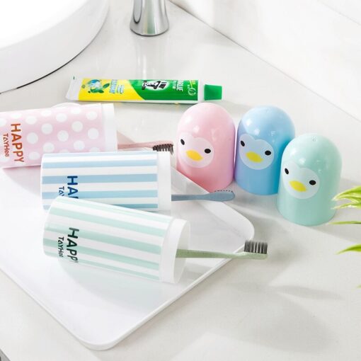 Toothbrush and toothpaste travel case in different colors are placed near wash basin.