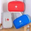 First aid medical bag is shown in grey, red, and blue color.