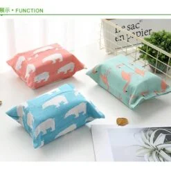 Cloth tissue holder placed on a white color table in 3 different color combinations