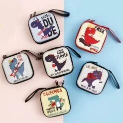 Cartoon earphone case shown in 6 different prints and colors.