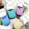 Sunglasses case presented in whale print in different colors.