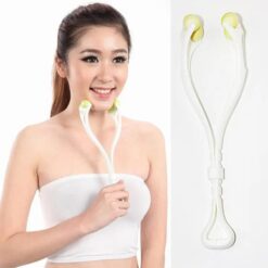 A woman is using double chin roller for thin face and get rid of double chin