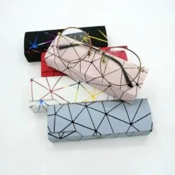 Sunglass case is presented in black, red, violet, white, and blue color