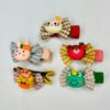 Cartoon hair pin is presented in 5 different color combination.