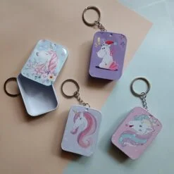 Tin box keychain is presented in 4 different prints and colors
