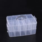 Two-layer, 20-grid storage organizer box made of clear plastic with Pink color snap-shut lid.