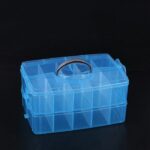 Two-layer, 20-grid storage organizer box made of clear plastic with Blue color snap-shut lid.