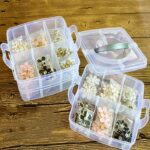 A variety of jewelry pieces neatly organized within the different compartments of the storage box.