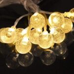 A package of 14-LED Crystal Ball String Light displayed with the product information clearly visible.