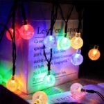 14-LED Crystal Mini Globe String Diwali Lights (Multicolor) A strand of 14-LED Crystal Mini Globe String Light (Multicolour) illuminated, showcasing cascading crystal globes glowing in vibrant hues, casting a mesmerizing display of colorful light.