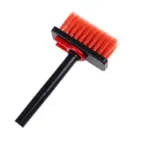 The 5-in-1 cleaning brush being used to clean window blinds, with the nylon bristles sweeping away dust and the flocking sponge gently cleaning delicate surfaces.