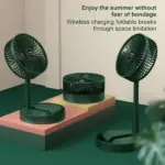 A USB telescopic folding fan positioned on a desk, directing cool air upwards.