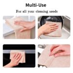 Effortless Cleaning: Using Oil-Absorbing Cloths for Kitchen Grease A person using an oil-absorbing cleaning cloth to wipe up a greasy mess on a kitchen surface. Cheaper than Amazon, Meesho, etc