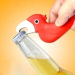 Parrot-shaped bottle opener made of metal for opening beverage bottles. Unique parrot-shaped bottle opener adding a touch of fun to your barware collection. Metal bottle opener in the shape of a parrot for easy opening of beer and soda bottles.