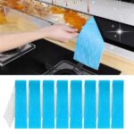 "Pack of 10 oil-absorbing felt covers for kitchen range hoods, capturing grease splatter. White felt oil-absorbing cover for a range hood, with adhesive backing for easy application. Close-up of a felt range hood cover absorbing oil splatter during cooking."