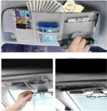 The car sun visor organizer securely attached to a car sun visor, showcasing its space-saving design and easy access to stored items