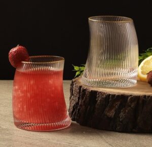 A small carafe creative glass in a prominent color, featuring a unique design and a capacity suitable for single servings - glasses, kitchenware, kitche items